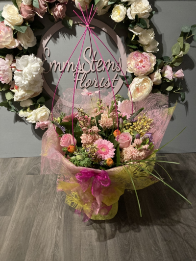 Spring Twist - Beautiful Spring Flowers arranged and luxury gift wrapped in water as an aqua packed bouquet. Finished with a modern twist Spring Twist - Beautiful Spring Flowers arranged and luxury gift wrapped in water as an aqua packed bouquet. Finished with a modern twist