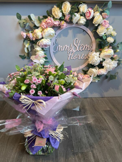 Blooms Delight - Aqua Packed bouquet in seasonal flowers in pink, white and purple flowers. Blooms Delight - Aqua Packed bouquet in seasonal flowers in pink, white and purple flowers.