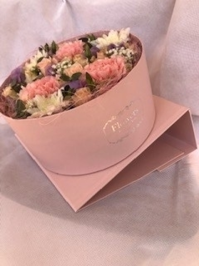 Surprise Flower Box - These beautifully presented Boxes arrive closed and then open up to reveal a lovely arrangement of Fresh Flowers. The sides then fold back to angle the box to show of the beautiful arrangement. The standard includes Roses and other Seasonal Flowers. The Large includes all Roses. Surprise Flower Box - These beautifully presented Boxes arrive closed and then open up to reveal a lovely arrangement of Fresh Flowers. The sides then fold back to angle the box to show of the beautiful arrangement. The standard includes Roses and other Seasonal Flowers. The Large includes all Roses.