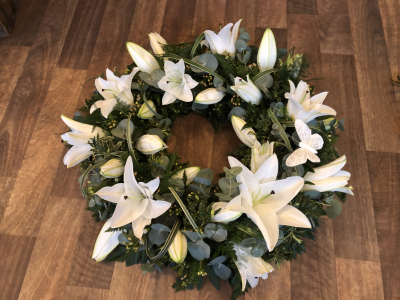 Luxury Lily Wreath - Luxury White Lily 16" Wreath include lovely foliage Luxury Lily Wreath - Luxury White Lily 16" Wreath include lovely foliage