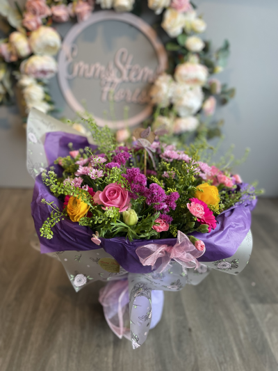 Rise and shine Mum - Fresh beautiful flowers arranged in an aquarium packed bouquet in shades of pink, purple & yellow. Rise and shine Mum - Fresh beautiful flowers arranged in an aquarium packed bouquet in shades of pink, purple & yellow.