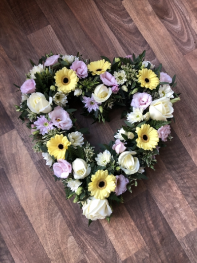Pastel Open Heart - Wreath- In Pastel Colours including Gerberas, Roses, Carnations and other filler flowers Pastel Open Heart - Wreath- In Pastel Colours including Gerberas, Roses, Carnations and other filler flowers