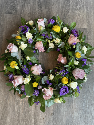 Wreath - Wreath in Mauve, Purple, Yellow & White seasonal flowers including memory lane roses.
Standard- 12"
Medium- 14"
Large-16"
Extra Large- 18" Wreath - Wreath in Mauve, Purple, Yellow & White seasonal flowers including memory lane roses.
Standard- 12"
Medium- 14"
Large-16"
Extra Large- 18"
