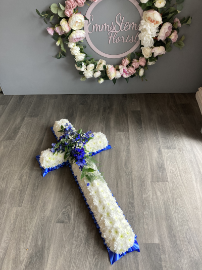 White Massed Cross with Blue Spray - White Massed Cross with Blue Ribbon & Flower Spray White Massed Cross with Blue Spray - White Massed Cross with Blue Ribbon & Flower Spray