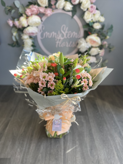 Peaches & Cream - Beautiful seasonal flowers in soft peach and cream colours, hand tied and finished in a luxury gift wrap presented in water. Peaches & Cream - Beautiful seasonal flowers in soft peach and cream colours, hand tied and finished in a luxury gift wrap presented in water.
